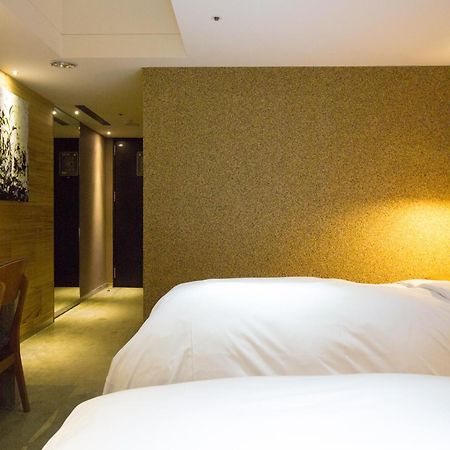 Inhouse Hotel Tchaj-čung Pokoj fotografie