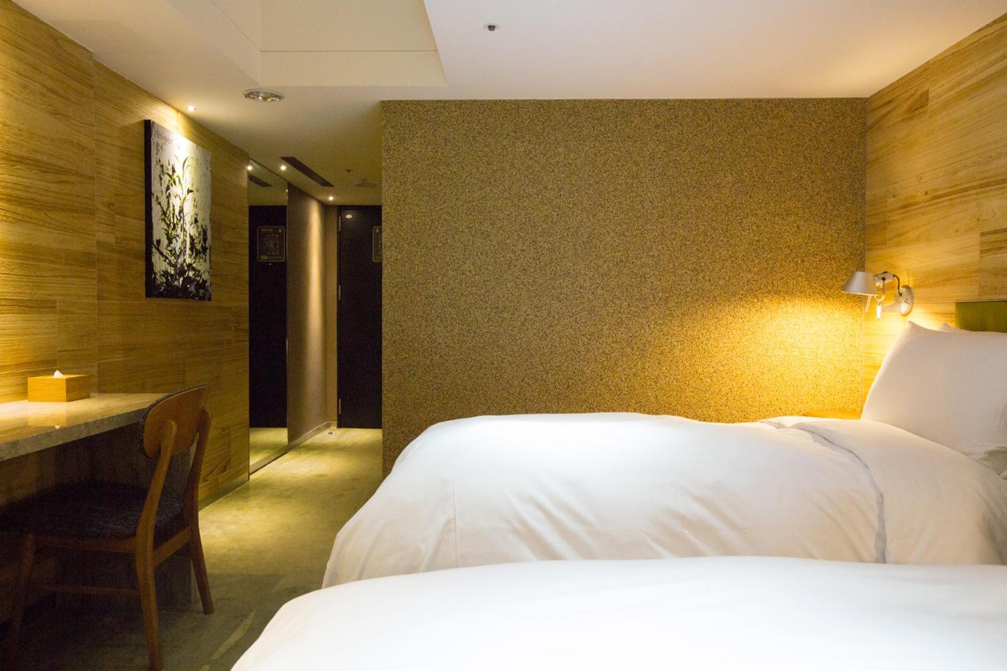 Inhouse Hotel Tchaj-čung Pokoj fotografie